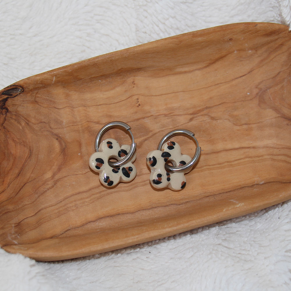 boucles d oreilles fleur motif leopard acier inoxydable