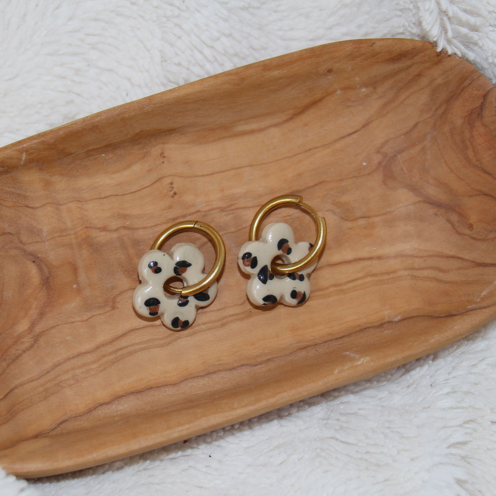 boucles d oreilles fleur motif leopard acier inoxydable